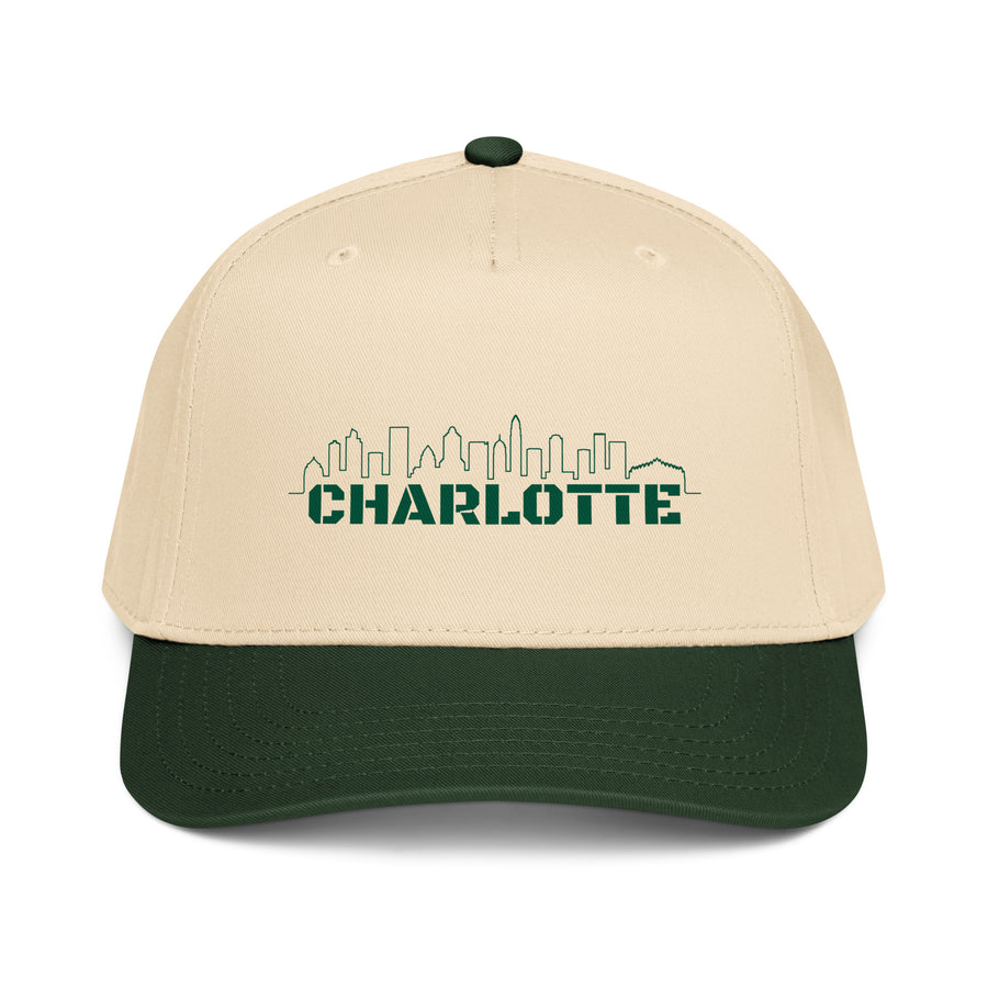 Charlotte Five-Panel Mid-Profile Hat in dark green natural, front view, featuring Charlotte skyline graphic